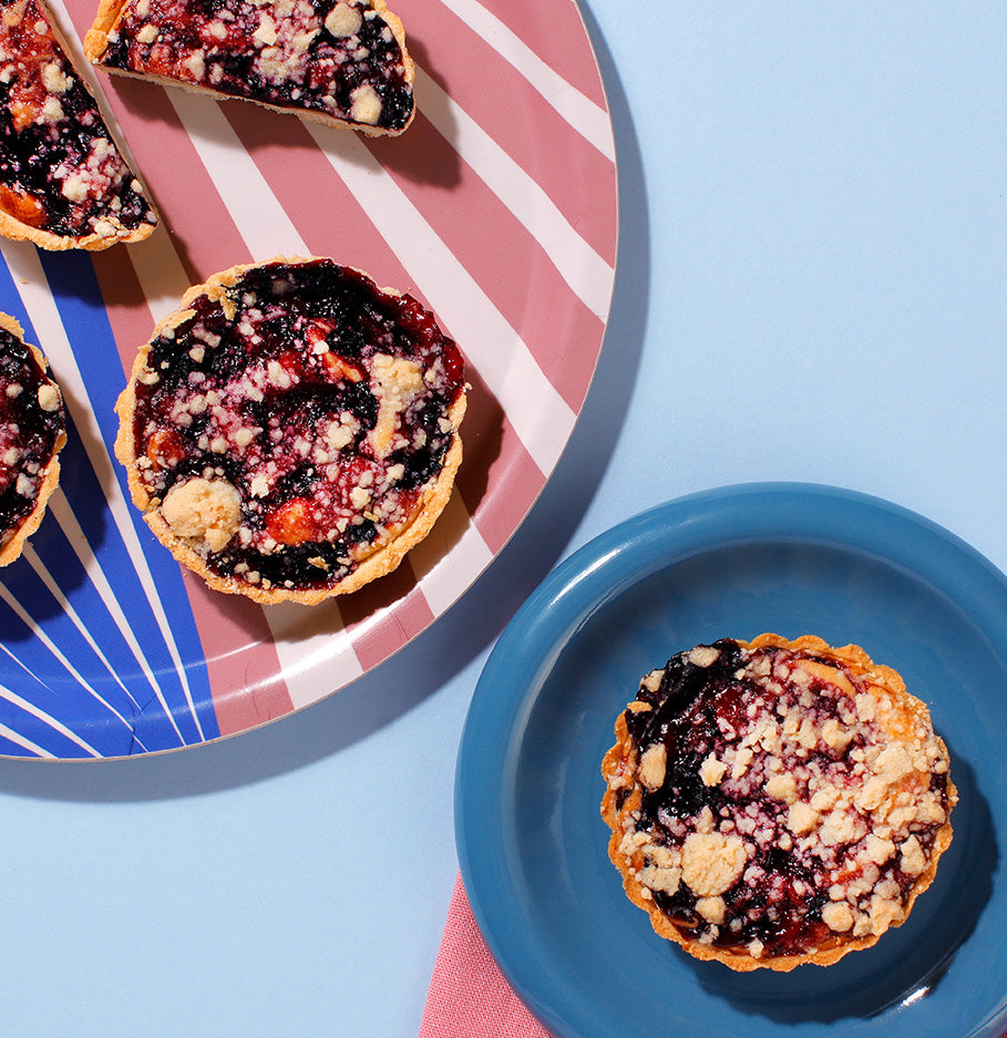 A serving suggestion of our delicious Blueberry Lemon Tarts - baked for coffeeshops so that you dont have to
